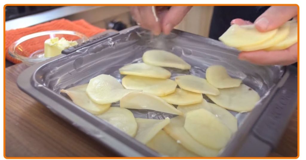 scalloped potatoes in tray