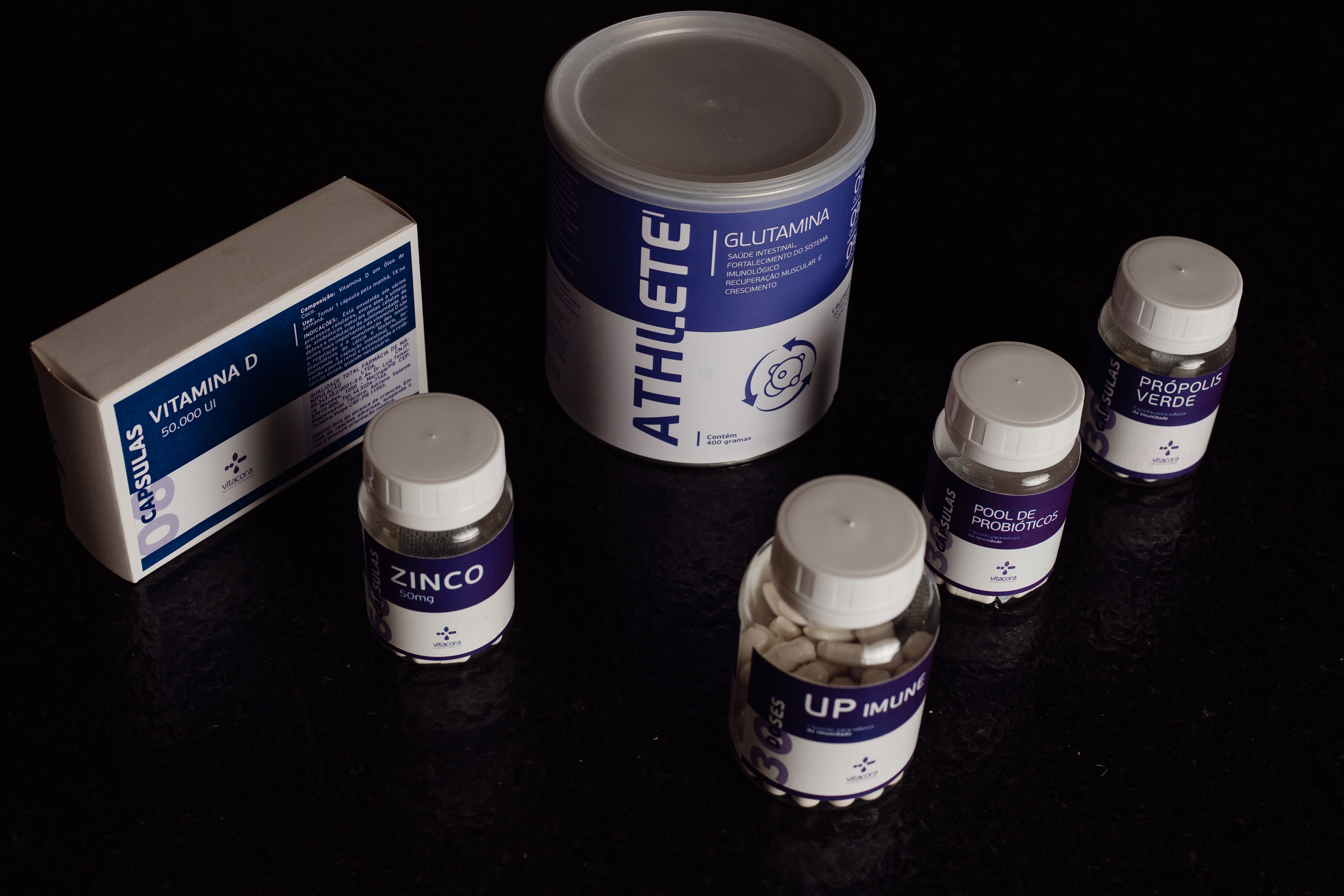 Close-up of nutritional supplement bottles, vitamins and capsules